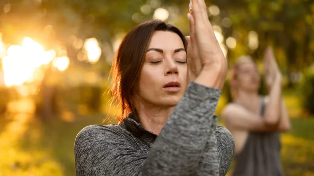 People practice yoga in nature